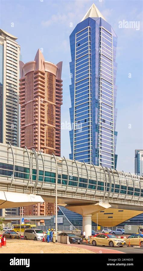 Dubai, UAE - February 02, 2020: Business Bay metro station and Sheikh Zayed Road with modern ...