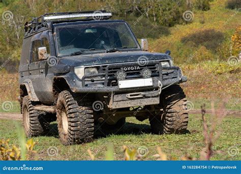 Toyota Land Cruiser Prado Off-road Expedition Truck on Autumn Forest ...