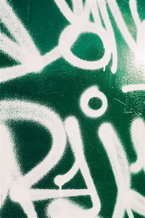 "White Spray Painted Graffiti On Green Metal Container" by Stocksy ...