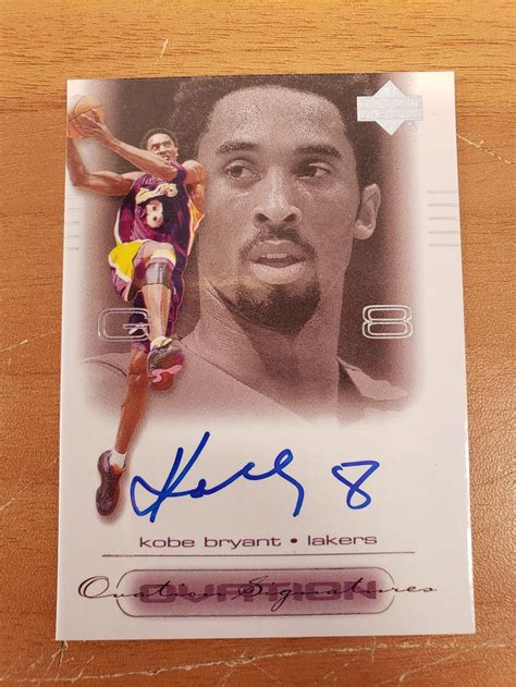 Lot - KOBE BRYANT AUTOGRAPHED UPPERDECK BASKETBALL CARD