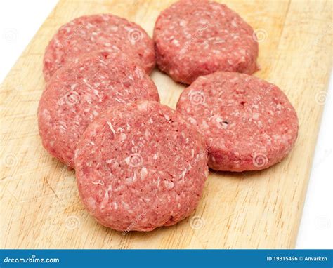 Raw beef burgers stock photo. Image of burger, uncooked - 19315496