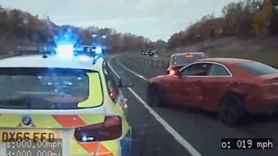 West Midlands car chase: Video shows drug dealers undertake traffic in front of police - BBC News