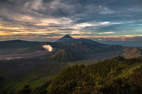 View of the Bromo and Semeru volcanoes from the top of the Tengger caldera at sunrise, East Java ...