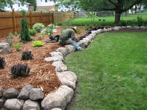 Fieldstone Boulder Wall & Planting Bed - Pahl's Market - Apple Valley, MN