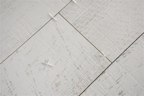 Ceramic wood effect tiles and tools for tiler on the floor 11920327 ...