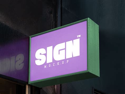 Dribbble - Free-Wall-Mounted-Signboard-Mockup-PSD-with-Reflection.jpg by Zee Que | Designbolts