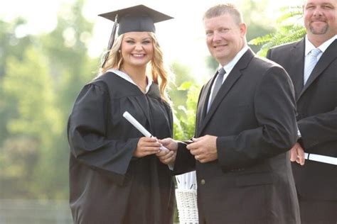 South Columbus High School graduation sends 182 graduates around the football stadium track ...