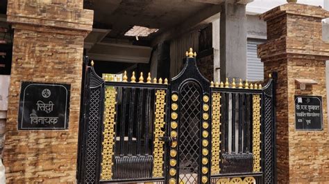 Front Elevation Main Gate Pillar Tiles Design In India / Drawing shows ...