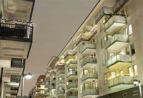 Apartment buildings at night stock photo