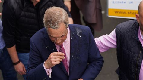 Woman, 25, charged with assault after milkshake thrown at Nigel Farage ...