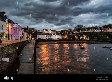 Portree Harbour, Isle of Skye, Scotland at dusk. February 2017, showing ...