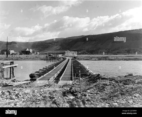 Treadway M2 Bridge built by 1139th across the Saar River at Schoden, Germany March 2, 1945 Stock ...