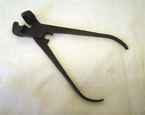 Antique iron musket ball mold. Hand forged iron tool. Lead