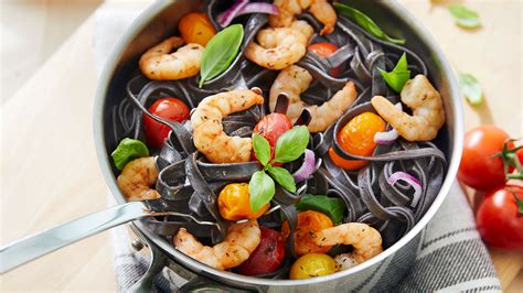 Squid ink pasta with prawns and tomatoes - Aquaculture Stewardship Council