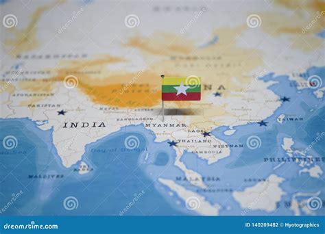 The Flag of Myanmar in the World Map Stock Photo - Image of paper ...