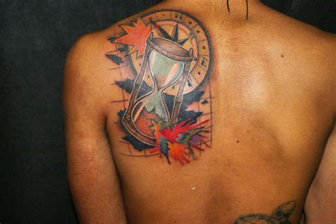 Sand clock tattoo in olive skin #tattoosandclock #tattoo #sandclocktattoo #sandclock