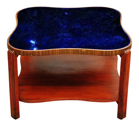 Art Deco large square wood coffee table with blue glass mirror top. The ...