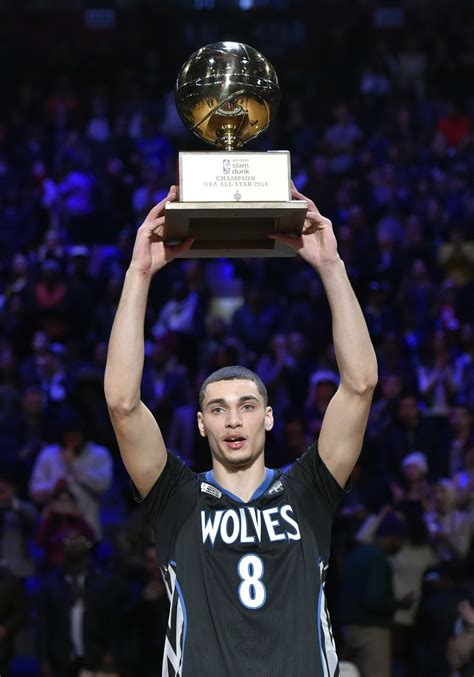 Minnesota Timberwolves guard Zach LaVine celebrates with the trophy ...