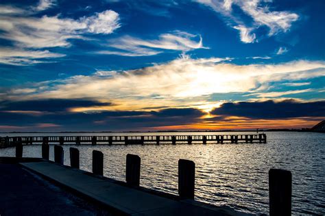 The pier at sunrise on Assateague Island Photograph by Carol Ward | Fine Art America