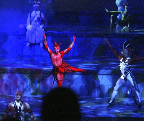 Cast members perform during the Cirque du Soleil “Mystere” show in the ...