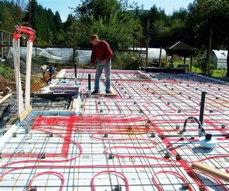 This is about installing hydronic radiant floor heating in a slab floor system. While it was ...