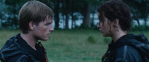 The Hunger Games (2012) - Peeta Mellark and Katniss Everdeen Photo (36282082) - Fanpop