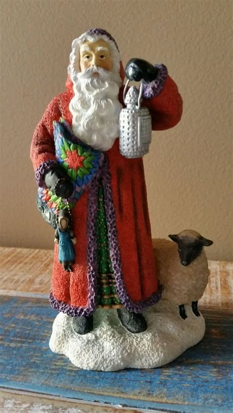 PIPKA AMISH COUNTRY SANTA carries an AMISH QUILT W/DOLL and TIN-PUNCHED ...