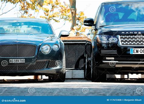 Two Luxury English Cars Parked in a Parking Lot Editorial Stock Photo - Image of bentley, black ...