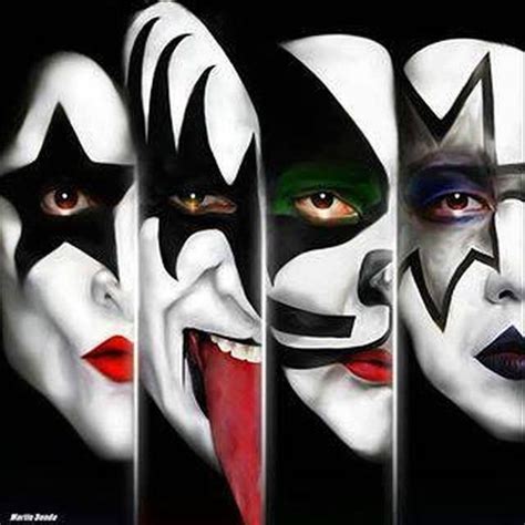 the faces of four clowns painted in white and black with red lips, nose ...