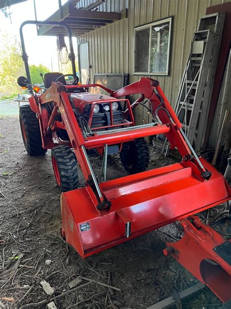 Kubota B7800 Tractor with Kubota LA402 and Digger Attachments and Maschio L52! | EstateSales.org