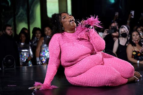 Lizzo Pops in Pink and Performs Hard for the Release of ‘Special’ – Footwear News