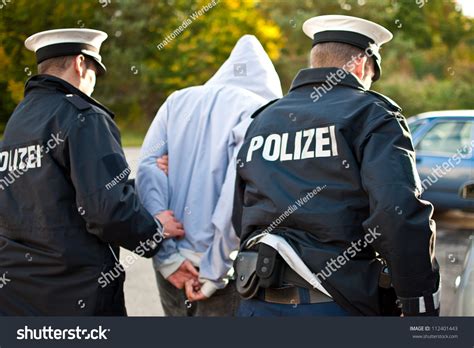 Police Officers Arresting Criminal Stock Photo 112401443 - Shutterstock