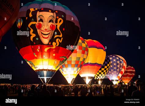 Illuminated colorful hot air balloons during Balloon Glow, Albuquerque International Balloon ...