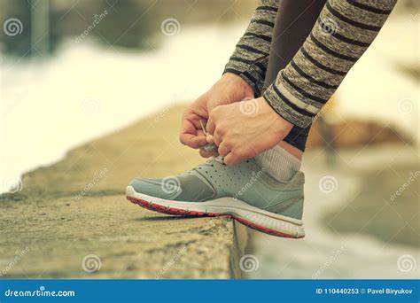 Closeup of Male Hands Tying Shoelaces in Winter Stock Image - Image of runner, exercise: 110440253