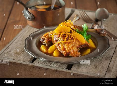 Roast duck in orange sauce. Caneton à l'orange Stock Photo - Alamy