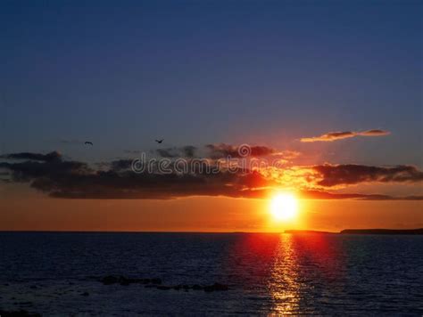 Sunset Sky Over Ocean, Galway Bay, Ireland, Warm Orange and Dark Blue ...