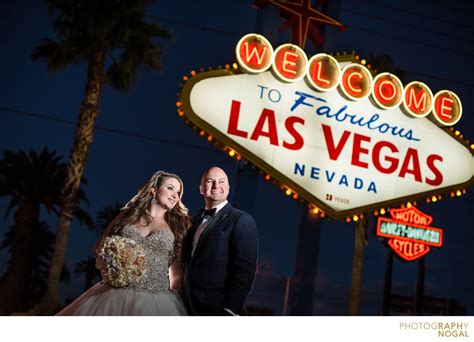 Bride and Groom in Front of Las Vegas Welcome Sign - Favourite Wedding ...