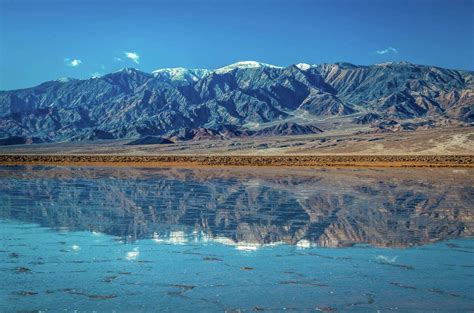 Rare 10-mile-long lake forms in Death Valley after heavy rains and flooding