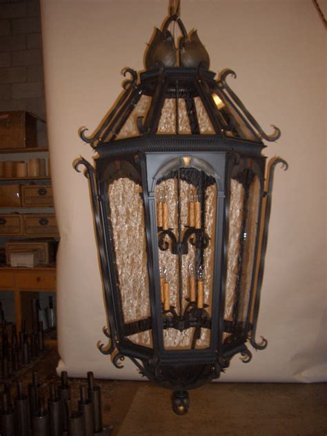 Large iron lantern with handmade leaves and heavy twisted iron ...