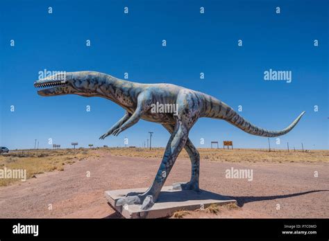 A huge dinosaur sculpture serves as a roadside attraction at the Hopi ...