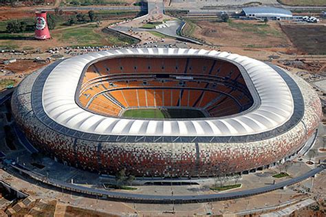 an aerial view of a soccer stadium in the middle of a field with grass ...