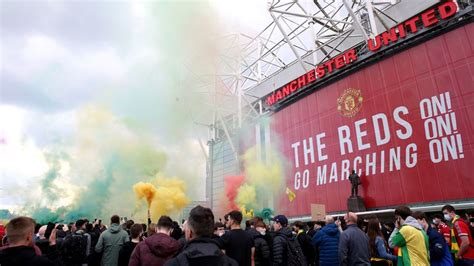 Manchester United protest: Man arrested after police officer injured ...