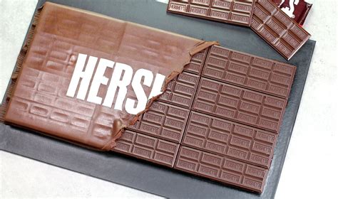 When you see how easy this Giant HERSHEY's Chocolate Bar Cake is to make, you'll definitely want ...