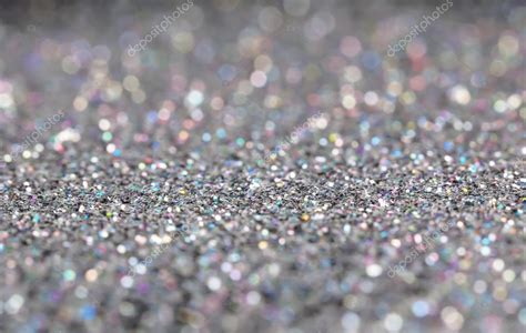 Sparkling silver glitter textured background Stock Photo by ©belchonock 126969284