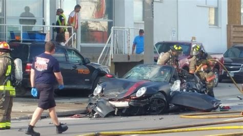 Driver, 31, charged in fatal Queen's Quay Porsche crash that killed passenger | CBC News