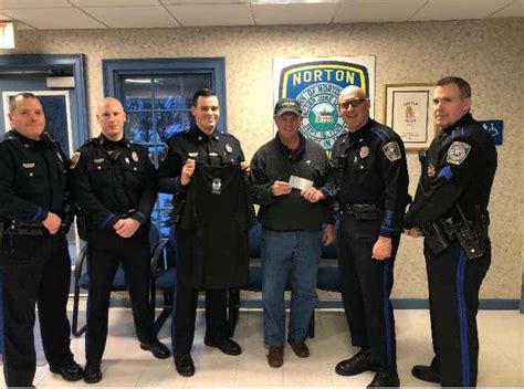 Norton Police Department present a check to CFKWC for No Shave November ...