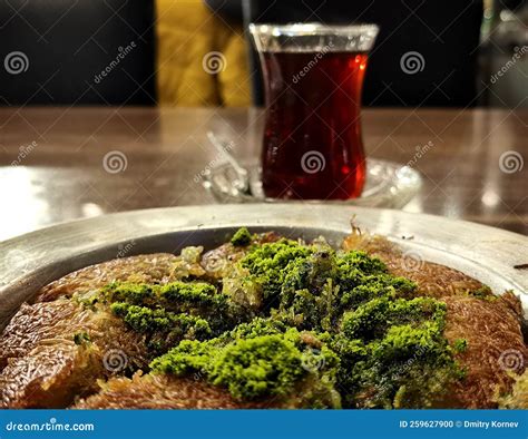 The Tea Time a La Turque with Kunefe and Traditional Tea Glass Stock ...