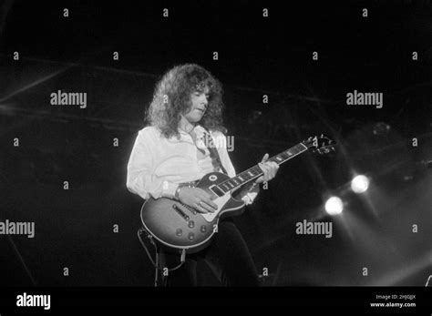 Scottish guitarist Brian Robertson performing with Thin Lizzy at the ...