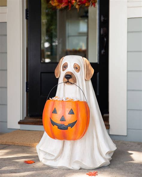 dogs dressed up as ghosts - Carrol Lea