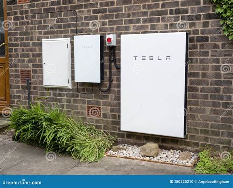 Tesla Powerwall 2 and Backup Gateway 2 on a House Wall Editorial Image - Image of battery ...